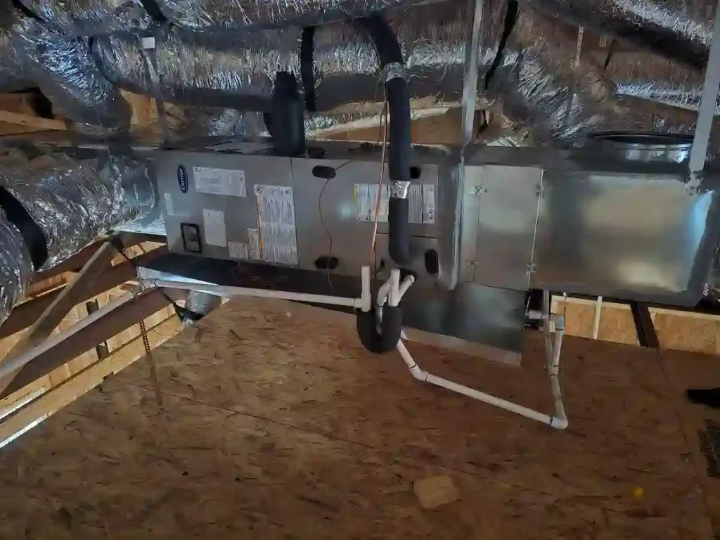 Heating installation in Irving TX — Mas Heating technician installing a new residential heating system