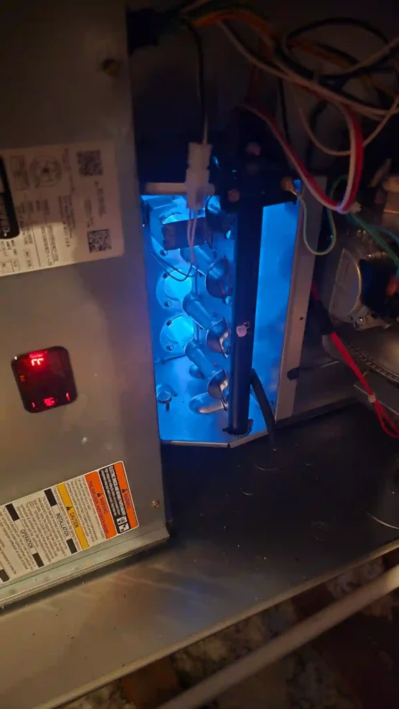 Residential furnace installation cost estimate in Irving TX — Mas Heating technician reviewing system with homeowner